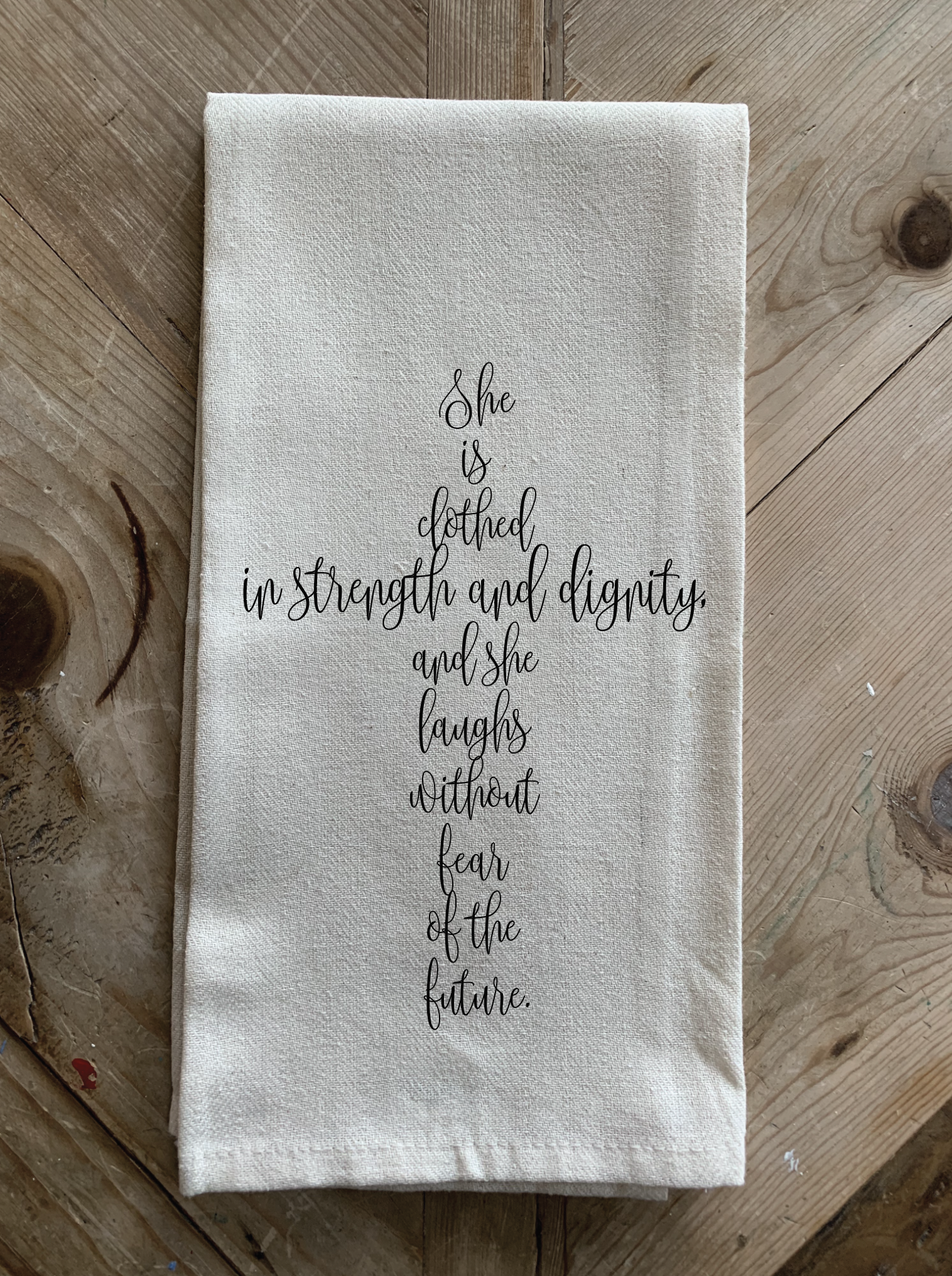 She is clothed in strength and dignity and she laughs without fear of the future.