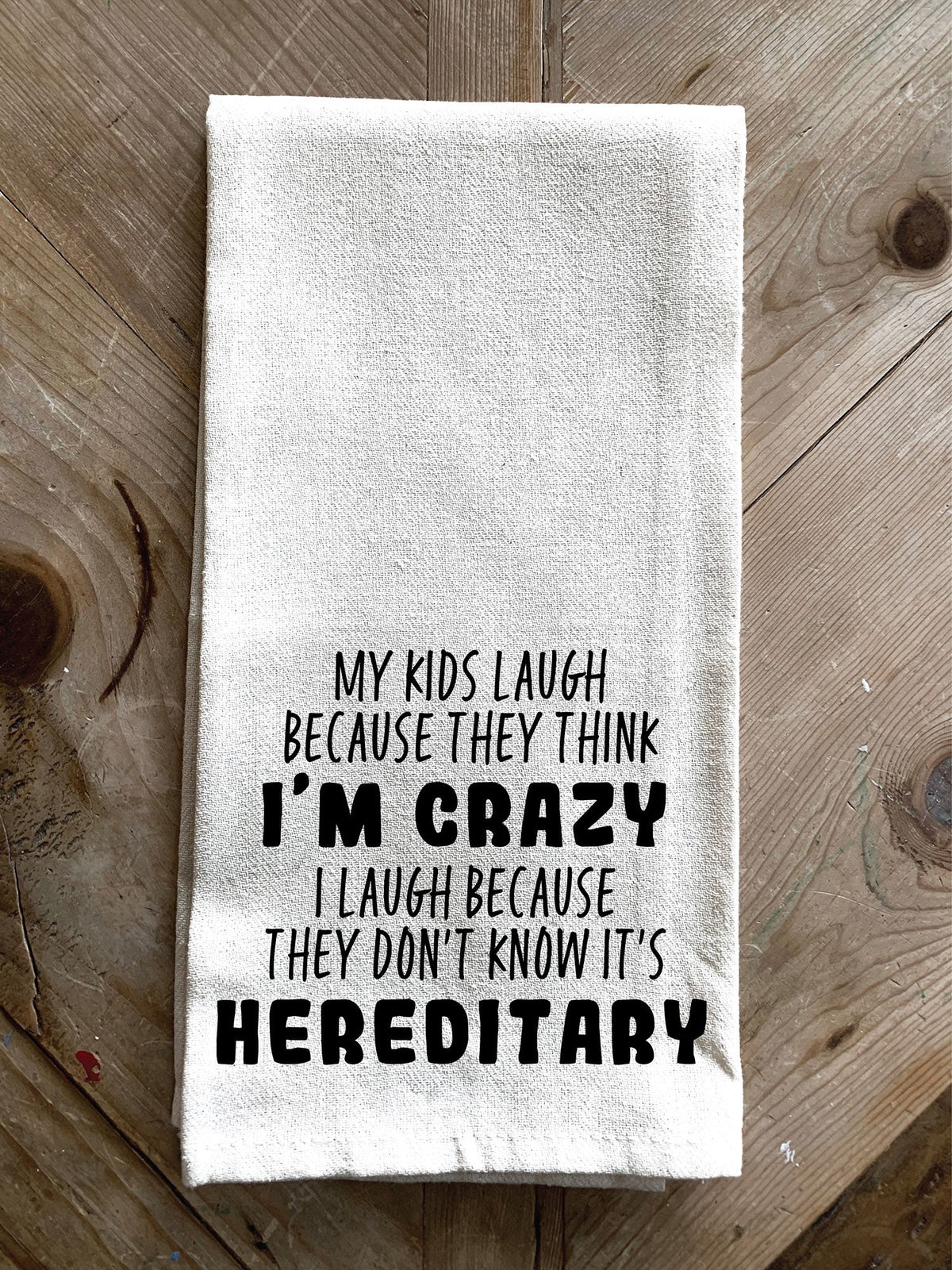 My kids laugh because they think I'm crazy, I laugh because they don't know it's hereditary / Kitchen Towel