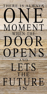 There is always one moment when the door opens and lets the future in / 12"x24" Reclaimed Wood Sign