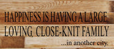 Happiness is having a large, loving, close-knit family...in another city. / 14"x6" Reclaimed Wood Sign