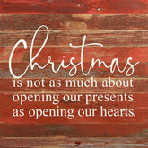 Christmas is not as much about opening our presents as opening our hearts. / 10"x10" Reclaimed Wood Sign