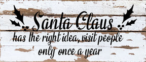 Santa Claus has the right idea, visit people only once a year / 14x6 Reclaimed Wood Wall Decor