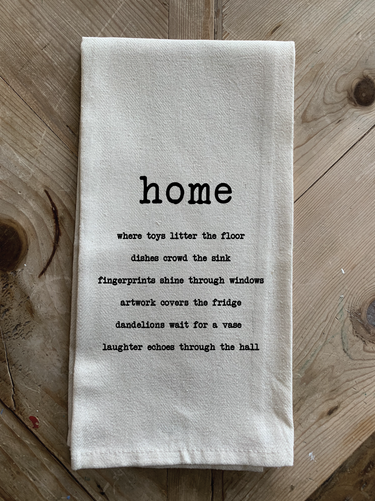 Home. Where toys litter the floor, dishes crowd the sink, fingerprints shine through windows, artwork covers the fridge, dandelions wait for a vase, laughter echoes through the hall.