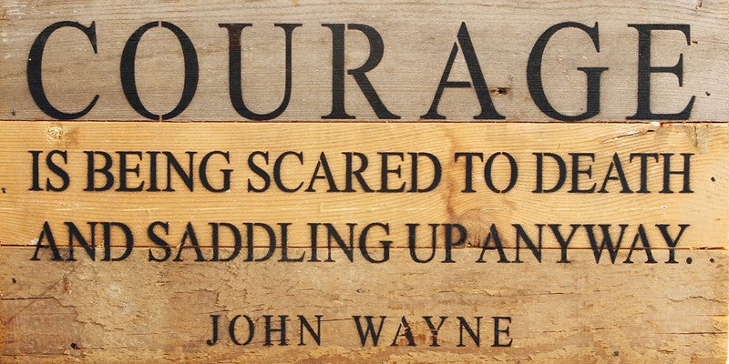 COURAGE is being scared to death and saddling up anyway. ~ John Wayne / 14"x6" Reclaimed Wood Sign
