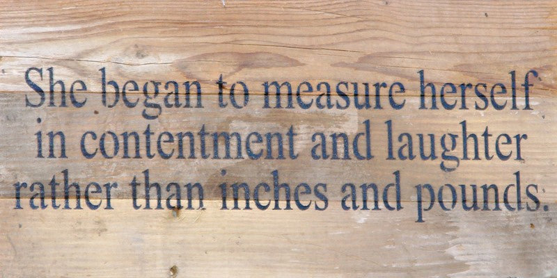 She began to measure herself in contentment and laughter rather than inches and pounds. / 14"x6" Reclaimed Wood Sign