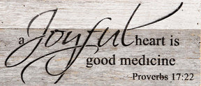 A joyful heart is good medicine. Proverbs 17:22 / 14"x6" Reclaimed Wood Sign