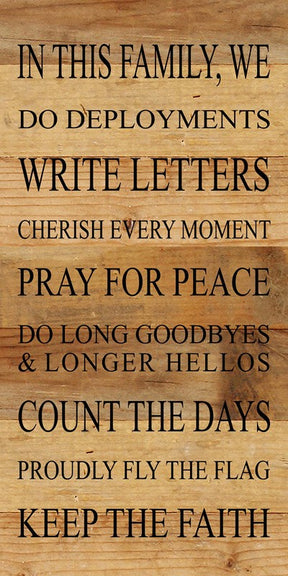 In this family, we do deployments, write letters, cherish every moment, pray for peace, do long goodbyes & longer hellos, count the days, proudly fly the flag, keep the faith / 12"x24" Reclaimed Wood Sign
